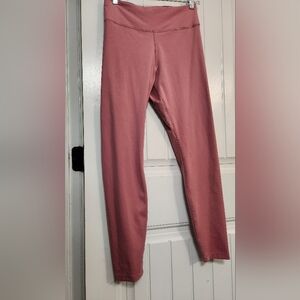 Pink High-Waisted Nike Dri-fit 2 Poxket Leggings.